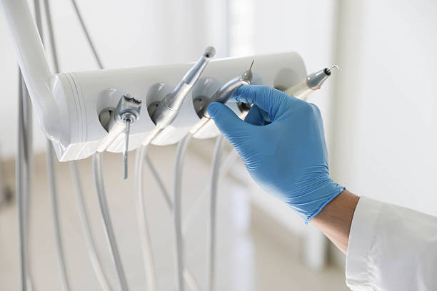 Professional Tooth Extraction technician working in Portland, TN
